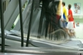 People run on treadmills at fitness club