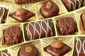 Sweet chocolates in golden box turn around