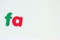 Hand put letters until they are form word FAMILY