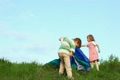 boy and little girl tenting outdoors
