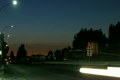 Cars are carried by on night highway.