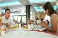 Family has breakfast at the Italian restaurant.